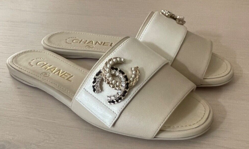 NIB Chanel 2023 Light Beige/White Lambskin Interlocking CC Mule Sandals Size 35
