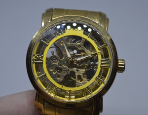 mce gold watch