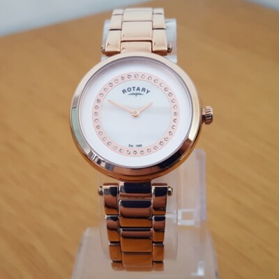 Analog Dresswatch Damen Roségold Armband rotierend verziert Glitzerperlen