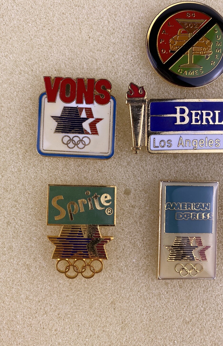 1984 Los Angeles Olympics pins Set of 7, LAPD, Sprite, 7-11, Amex, Vons, Conroys