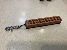 Cartridge loading strip 45 caliber wooden with crocidile hide backing