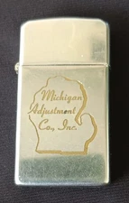 Vintage ZIPPO Slim Lighter Engraved Michigan Adjustment Co, Inc 1967