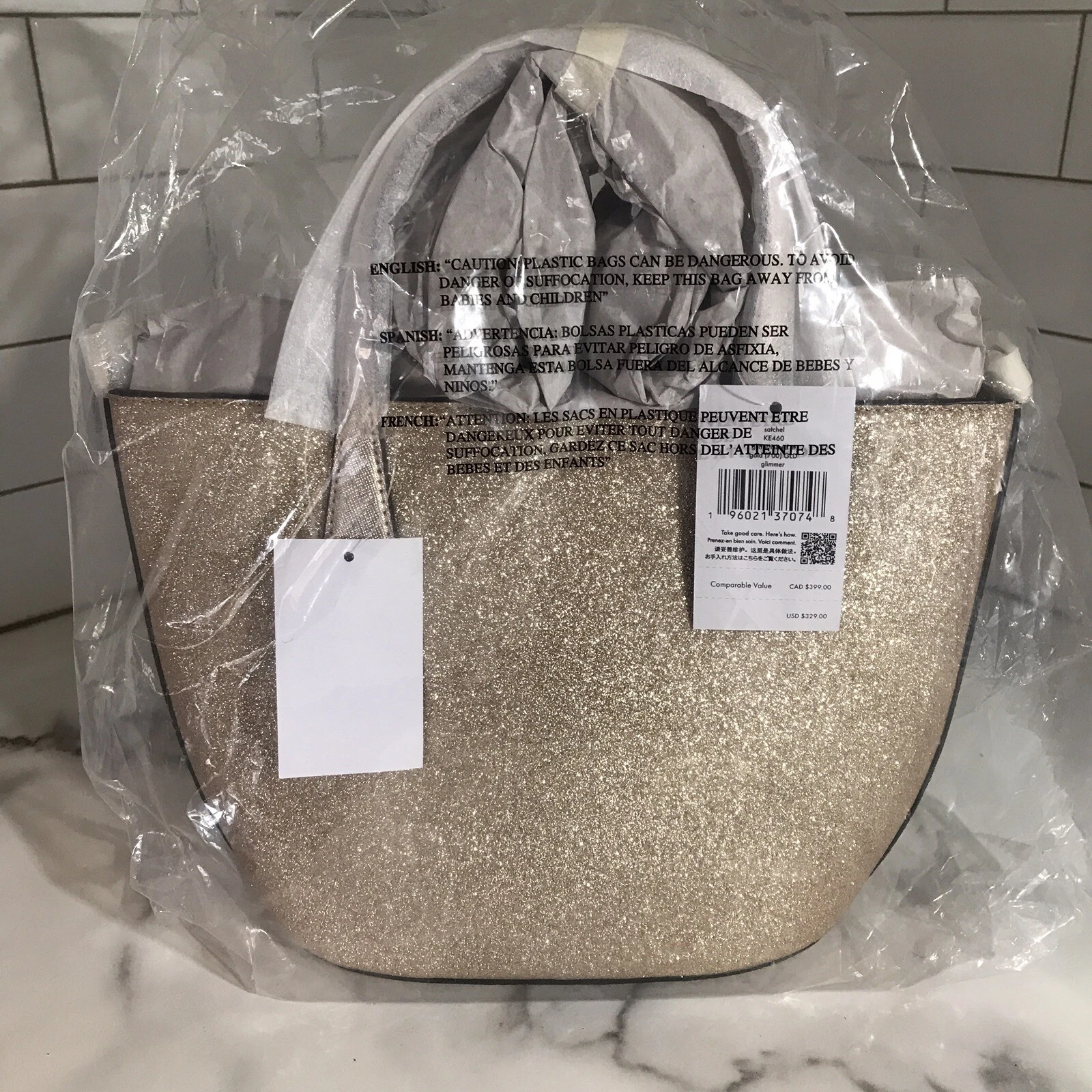 Borsa a mano Kate Spade nuova con etichetta Glimmer oro glitter pelle