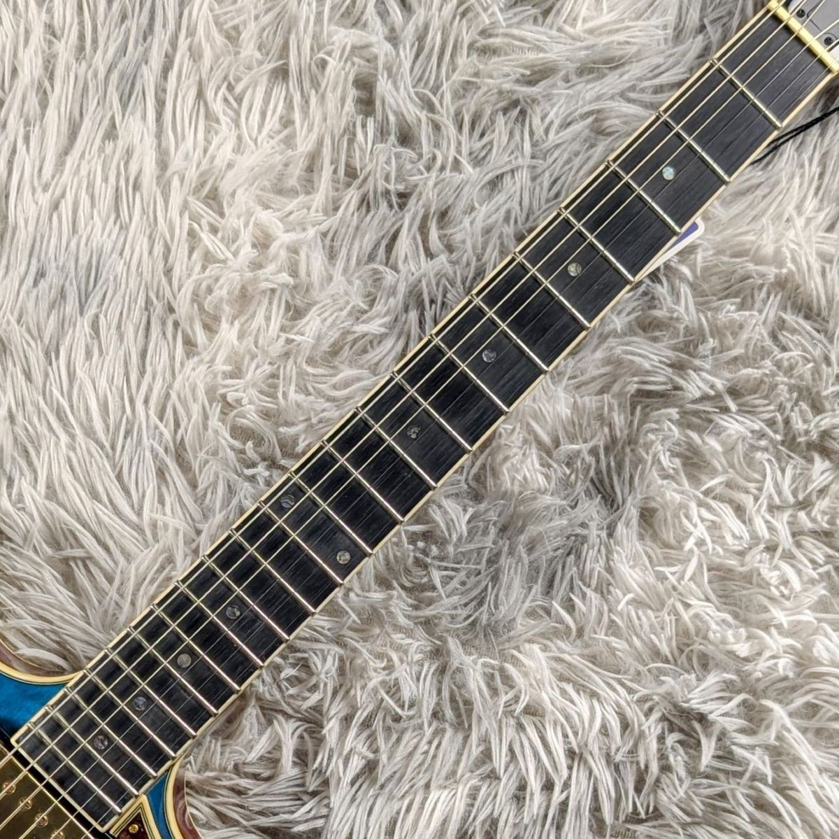 Ibanez AMH90QM TBL Translucent Blue electric guitar with gig