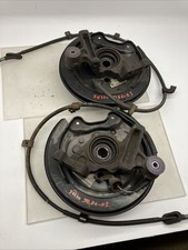 SUBARU IMPREZA TYPE R WRX STI  R180 REAR HUBS 5 X 100 WITH NEW BACK PLATES.