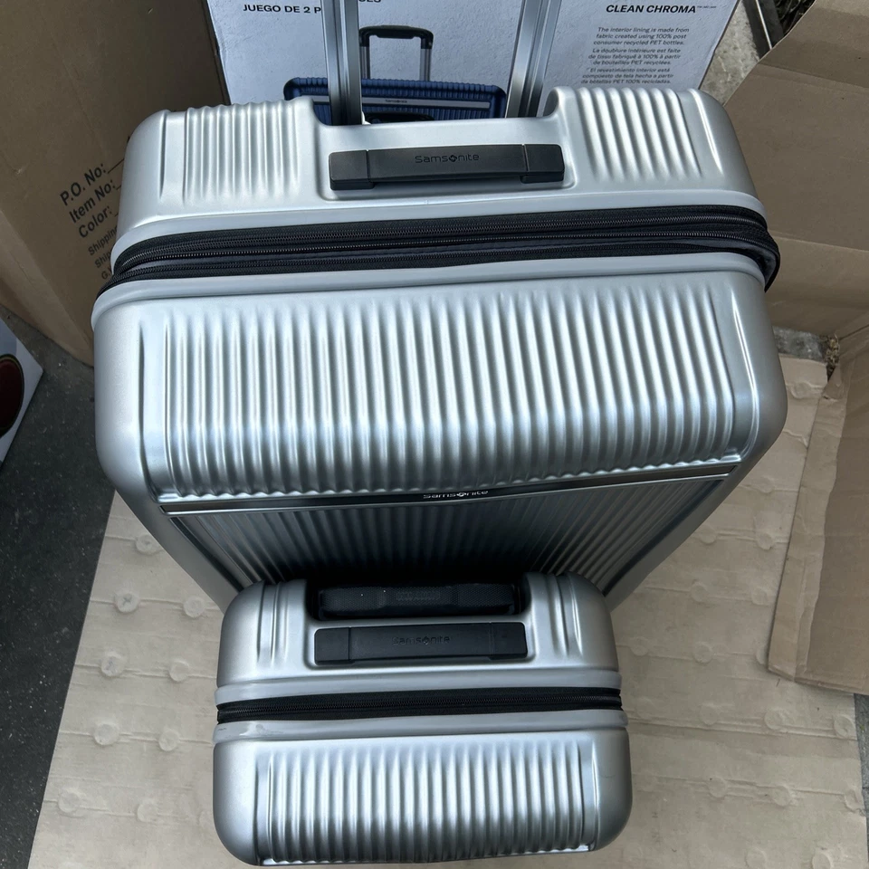 Juego de equipaje giratorio expandible rígido Samsonite Blackstone plateado de 2 piezas Foto 2 de 4