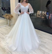 Elegant Wedding Dresses Puff Sleeve Backless Lace Bead A-Line Bridal Gowns Train