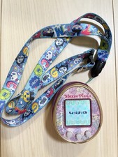 Bandai 4U Tamagotchi Pink with Rare Kawaii cover mezzo piano/excellent condition
