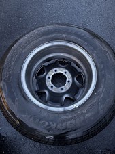 Full set barely used 2023 Tacoma Stock rims and tires…. Less than 2000 miles