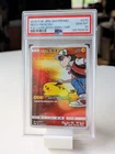 Pokemon Red's Pikachu P.M. Center 20th Ann. JPN Full Art Promo 270/SM-P PSA 10