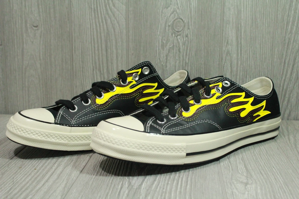 Converse with top flames on them