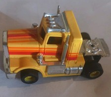 TYCO US 1 ELECTRIC TRUCKING PETERBILT TRUCK SLOT CAR IN YELLOW