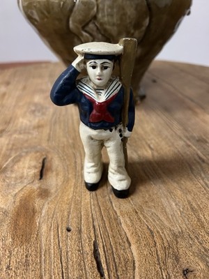 Vintage-CAST IRON CRACKER JACK SAILOR FIGURINE