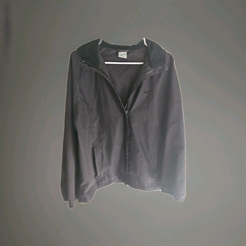 Nike Women Black Light Polyester Zip Windbreaker Jacket-Large