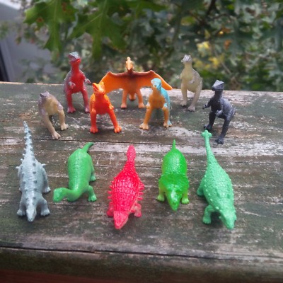 Twelve assorted three inch dinosaurs