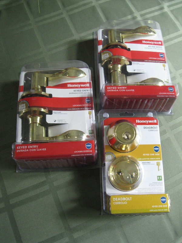 HONEYWELL DOOR KEYED POLISHED BRASS 2 HANDLES/LEVERS AND 1 DEADBOLT