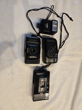 35mm CAMERAS LOT OF THREE WITH ONE FLASH