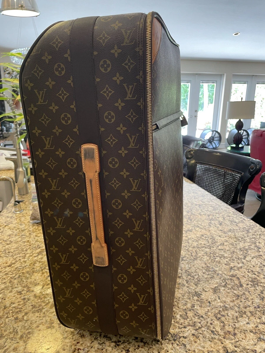 Louis Vuitton Pegase suitcase in brown monogram canvas and natural leather