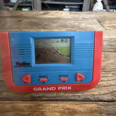 Playtime Grand Prix Handheld Electronic Console- LCD Screen 1980's- Working