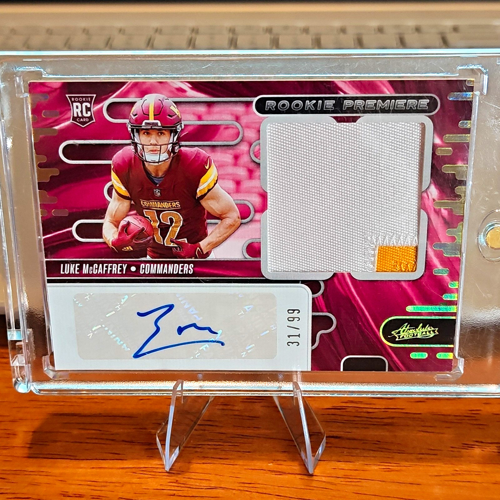 Panini 2024 Absolute Rookie Premiere Materials Auto Patch Luke McCaffrey 31 /99
