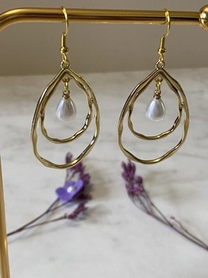 Elegante Ohrringe mit Perle - Zeitloser Chic »