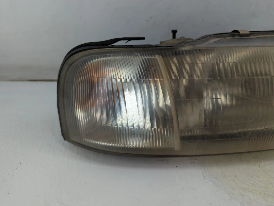 Faro luz izquierda conductor Suzuki Esteem 1995-1998 OEM YNN9O Foto 2 de 4