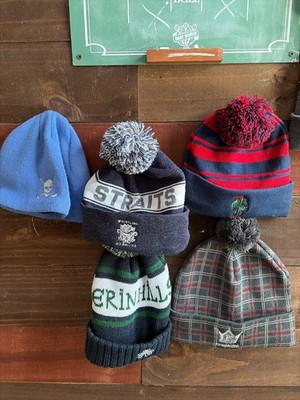 A collection of ski caps from some of the finest golf courses in the world
