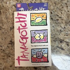 Vintage 1996 1997 Bandai Pink  Green With Blue Buttons Tamagotchi in box 1800