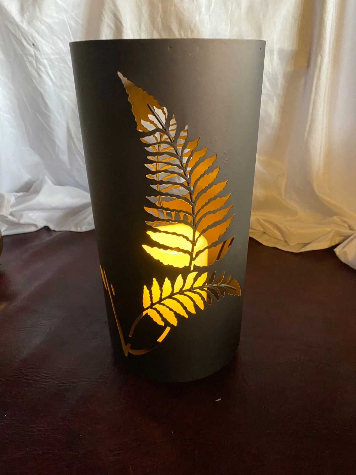 Rustic Metal Fern Luminary, a decorative garden column or indoor lighting