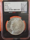 1882-CC NGC MS62 Morgan Silver Dollar Vaultbox