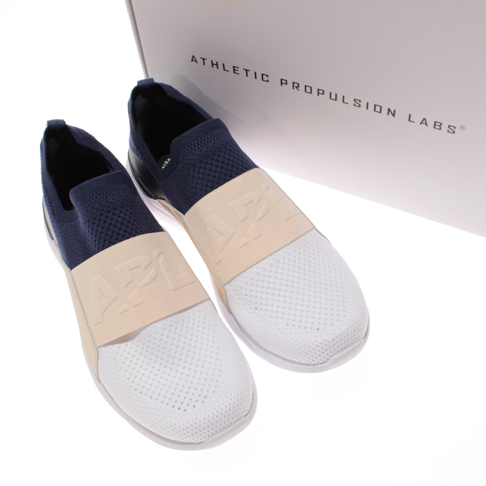 Sneakers slip on APL NUOVE CON ETICHETTE da donna Techloom Bliss taglia 10 US in blu navy spiaggia bianco