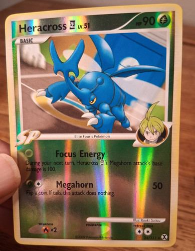 Nintendo Pokémon TCG Heracross SP Rising Rivals 24/111 Rev Holo Rare Eng 2009