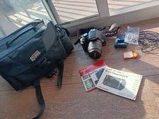 Canon EOS Rebel T1i DSLR Camera Bundle w/ 18 55mm Lens, Bag, Charger Manuals