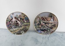 A pair of Franklin Mint, decor…