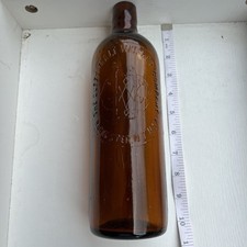antique amber glass bottle from The Duffy Malt Whiskey Company