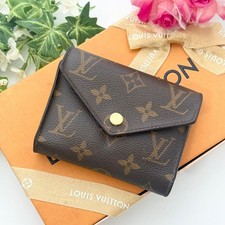 Portafoglio LOUIS VUITTON: Victorine M62360 rosa marrone nuovo riparazione bottoni senza scatola;--