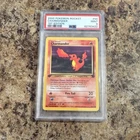 1st edition Team Rocket Charmander (50/82) PSA 9