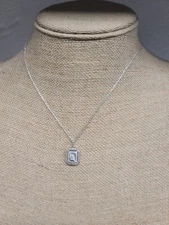 1/4 CT. T. W. Multi-Diamond Double Octagon Frame Pendant and Stud Earrings Set i