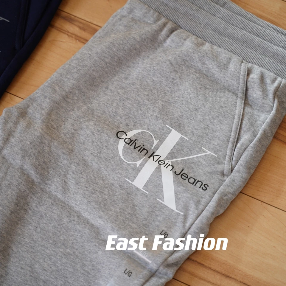 Pantalones deportivos Calvin Klein Jeans para hombre azules/grises con logotipo de monograma polar Foto 3 de 4