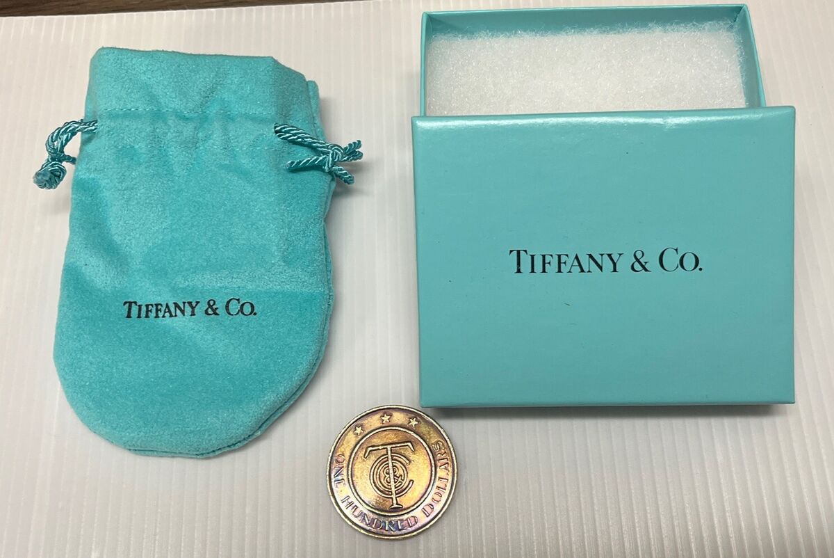 Tiffany & Co. $100 Tiffany Gift Coin with Original Bag and Tiffany & Co. $100 Tiffany Gift Coin with Original Bag and