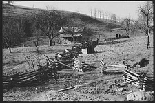 Photo:Rail fence and farm home. Near Luray, Virginia