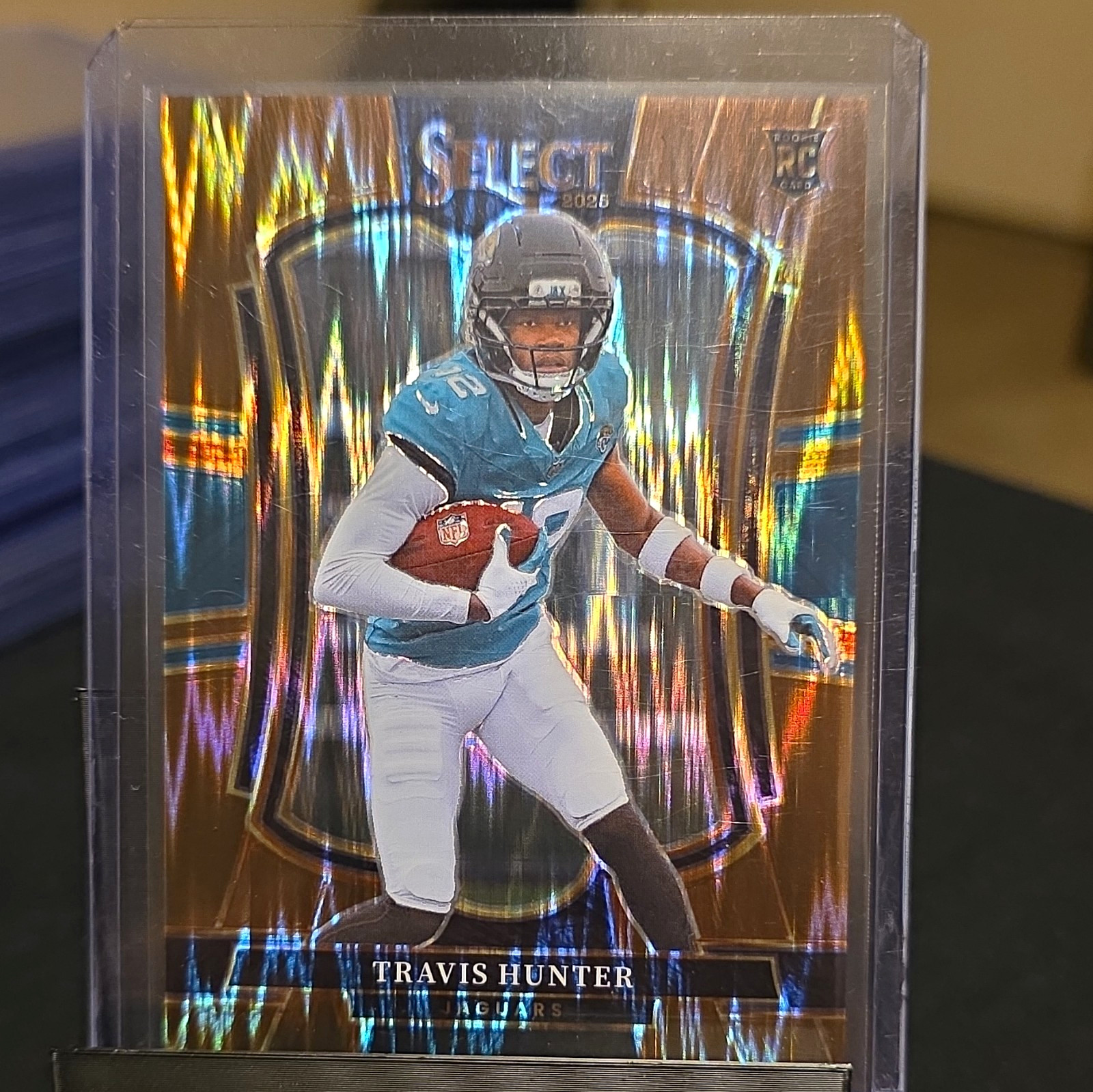 2025 Panini Select Premier Level Travis Hunter #128 Copper Shock RC /899