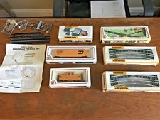 Bochmann train ,tracks , power pack bridge trestle ,and signs