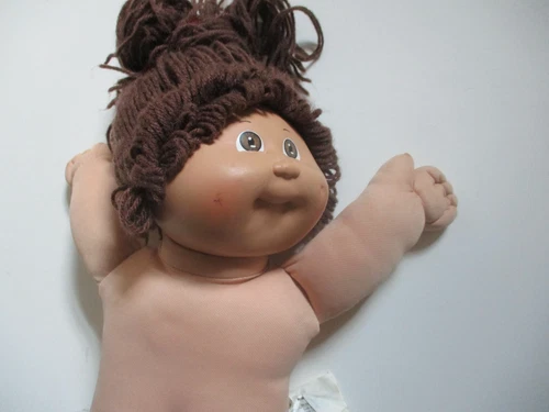 Vintage Cabbage patch doll with 4 outfits