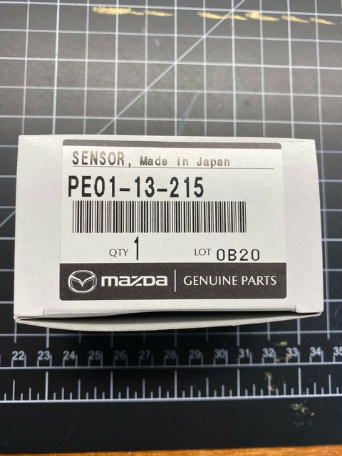 Pe0113215 mazda датчик