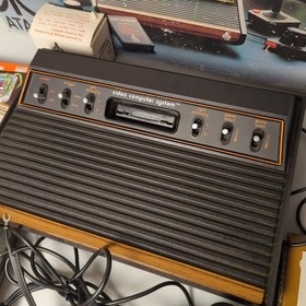 Atari CX-2600 Console Bundle Complete in box w 10 CIB games working 1980