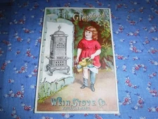 Old Tradecard Glenwood Weir Stove Co. Taunton Mass Girl Flowers 5 1/8 x 3 7/16"