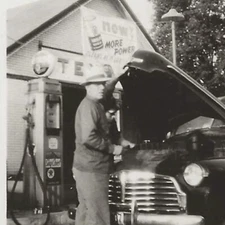 Vintage Photo Man Looks Under Hood Of Car Gas Station Texaco Sky Chief Gasoline