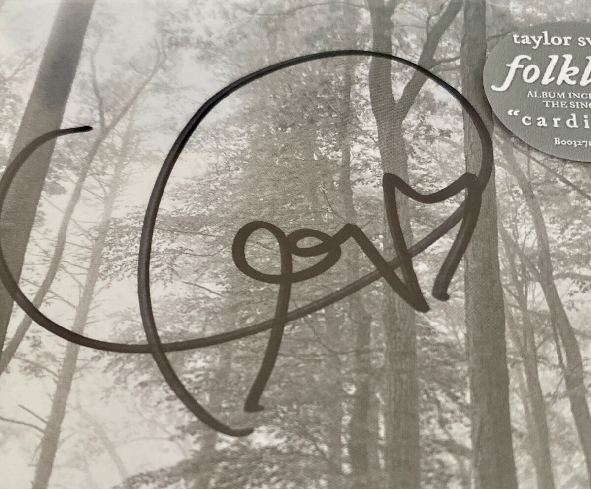 Taylor Swift Autographed Rare Deluxe Folklore Hand Signed CD Taylor Swift Autographed Rare Deluxe Folklore Hand Signed CD