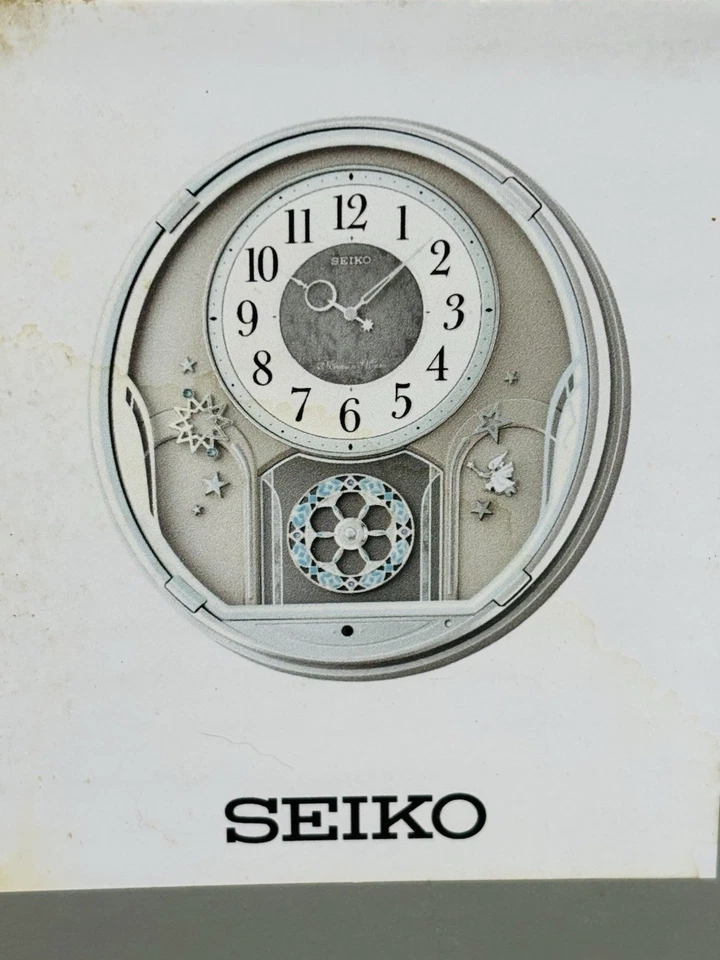Reloj de pared analógico Seiko AM401S plateado 18 melodías Foto 3 de 4